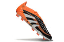 Chuteira Adidas Predator Elite FG - Preta e Laranja em ângulo lateral destacando o design e as cores vibrantes.