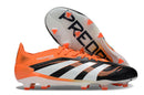 Chuteira Adidas Predator Elite FG - Preta e Laranja com design estiloso e detalhes em preto, laranja e branco.