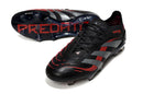 Chuteira Adidas Predator Elite FG - Preta e Vermelha com design avançado para controle e precisão no futebol.