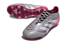 Chuteira Adidas Predator Elite FG - Rosa Ed. "Bellingham" em destaque, mostrando design inovador e cores vibrantes.