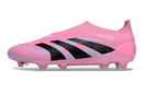 Chuteira Adidas Predator Elite FG - Rosa com design vibrante e moderno, destacando-se no campo.