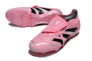 Chuteira Adidas Predator Elite FG - Rosa em cor rosa vibrante com detalhes em preto e prata.