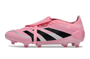 Chuteira Adidas Predator Elite FG - Rosa com design vibrante e tecnologia avançada para desempenho em gramados naturais.