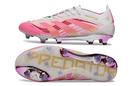 Chuteira Adidas Predator Elite FG - Rosa, com design arrojado e tecnologia avançada para futebol.