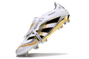 Chuteira Adidas Predator Elite FG Tongue Branca e Dourada "Teamgeist" com design especial e tecnologia de ponta.