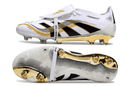 Chuteira Adidas Predator Elite FG Tongue Branca e Dourada "Teamgeist" com design clássico e tecnologia de performance.