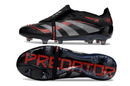 Chuteira Adidas Predator Elite FG Tongue Preta e Vermelha em vista lateral e inferior, destacando seu design inovador.