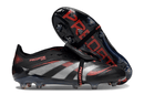 Chuteira Adidas Predator Elite FG Tongue Preta e Vermelha com design arrojado e tecnologia de ponta.