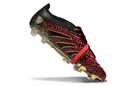 Chuteira Adidas Predator Elite FG Tongue "Year of the Snake" com design exclusivo e sofisticado para performance em campo.