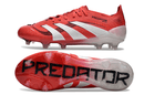 Chuteira Adidas Predator Elite FG - Vermelha e Branca com design arrojado e solado transparente.