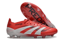 Chuteira Adidas Predator Elite FG - Vermelha e Branca com design arrojado e tecnologia de ponta para desempenho em campo.