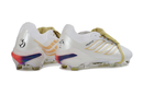 Chuteira Adidas Predator Elite FG 26 - Ed. "Zidane" em branco e dourado, design profissional e tecnologia Controlskin.