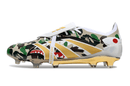 Chuteira Adidas Predator Elite Fold-Over Tongue FG - Branca, Dourada e Verde lateral com design camuflado.