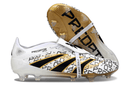 Chuteira Adidas Predator Elite Fold-Over Tongue FG - Branca, Dourada e Vermelha com design moderno e esportivo.