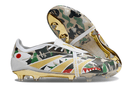 Chuteira Adidas Predator Elite Fold-Over Tongue FG - Branca, Dourada e Verde, com design camuflado e detalhes em dourado.