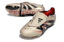 Chuteira Adidas Predator Elite Fold-Over Tongue FG - Dourada, Preta e Vermelha, design inovador e alto desempenho.