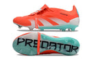 Chuteira Adidas Predator Elite Tongue FG - Laranja e Ciano vista lateral e sola, design vibrante para máxima performance.