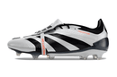 Chuteira Adidas Predator Elite Tongue FG - Preta e Branca lateral, exibindo design elegante e tecnologia avançada.