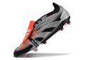 Chuteira Adidas Predator Elite Tongue FG - Preta e Cinza em ângulo com design sofisticado e tecnologia de ponta.