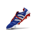 Chuteira Adidas Predator Mania Elite FG Azul em destaque, mostrando detalhes de design e cores vibrantes.