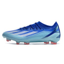Chuteira Adidas X Crazyfast FG Elite .1 Azul vista lateral com design aerodinâmico e cores vibrantes.