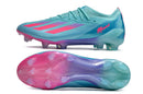 Chuteira Adidas X Crazyfast FG Elite .1 Rosa Miami vista lateral e sola em azul e rosa.