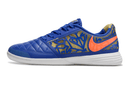Chuteira Futsal Nike Lunar Gato IC - Azul, laranja e Dourada com design vibrante e tecnologia avançada.