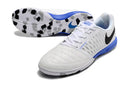 Chuteira Futsal Nike Lunar Gato IC Branca e Azul vista lateral, com sola IC para futsal