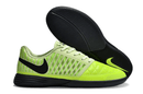 Chuteira Futsal Nike Lunar Gato IC - Verde e Preta com design vibrante e tecnologia de performance.