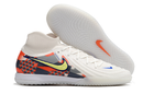 Chuteira Futsal Nike Phantom Luna IC - Branca, Cinza e Laranja "Barna Pack" com design inovador e sola IC.