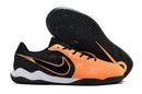 Chuteira Futsal Tiempo 10 Legend Elite IC Laranja e Preta com sola IC e design moderno para performance.