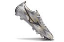Chuteira Mizuno Alpha II FG "Platinum" com design prateado e tecnologia de ponta para desempenho em campo.