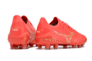 Chuteira Mizuno Morelia Neo 3 FG Vermelha com design vibrante e ajuste anatômico para conforto em campo.