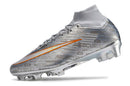 Chuteira Nike Air Zoom Mercurial FG Superfly IX Elite FG - Entrega Imediata em prata com detalhes laranjas.