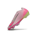 Chuteira Nike Air Zoom Mercurial FG Vapor 16 Rosa em ângulo, destacando o design e as cores vibrantes.