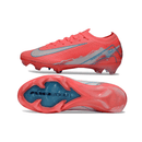 Chuteira Nike Air Zoom Mercurial FG Vapor 16 Vermelha vista lateral e inferior com detalhe do solado