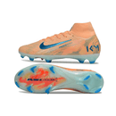 Chuteira Nike Air Zoom Mercurial Superfly 10 Elite FG Ed. Mbappé em tom laranja, vista lateral e sola.