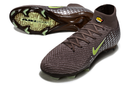 Chuteira Nike Air Zoom Mercurial Superfly 10 Elite FG Verde em cor bronze, ideal para futebol em campos naturais.
