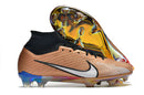 Chuteira Nike Air Zoom Mercurial Superfly 9 Elite FG em cor dourada e detalhes em preto.