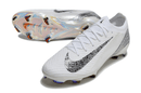 Chuteira Nike Air Zoom Mercurial Vapor 16 Edição Especial Elite FG -Branco e Preto, design premium e tecnologia de ponta.