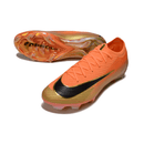 Chuteira Nike Air Zoom Mercurial Vapor 16 Laranja e Preta com design aerodinâmico em destaque.