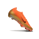 Chuteira Nike Air Zoom Mercurial Vapor 16 Laranja e Preta em destaque com design aerodinâmico e cores vibrantes.
