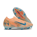 Chuteira Nike Air Zoom Mercurial Vapor 16 "Mbappé" em tons de laranja e azul, perfeita para velocidade e controle