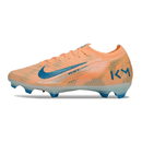 Chuteira Nike Air Zoom Mercurial Vapor 16 "Mbappé" em laranja com detalhes azuis, ideal para jogadores ágeis.