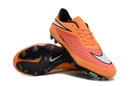 Chuteira Nike Hypervenom Elite FG Laranja com design aerodinâmico e controle excepcional em campo.