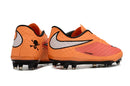 Chuteira Nike Hypervenom Elite FG Laranja com design aerodinâmico e tecnologia avançada para controle excepcional.