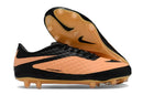 Chuteira Nike Hypervenom Elite FG Laranja e Preto com design anatômico e sola FG para jogadores