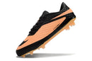 Chuteira Nike Hypervenom Elite FG Laranja e Preto vista lateral com solado firme e design moderno.