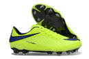 Chuteira Nike Hypervenom Elite FG - Verde e Azul com design aerodinâmico e solado FG para performance em campo.