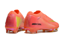 Chuteira Nike Mercurial Air Zoom Vapor 16 Edição EspecialElite Cosmic 2 FG, vista traseira em laranja vibrante com detalhes em amarelo.